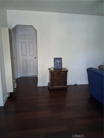 a view of livingroom with furniture and wooden floor