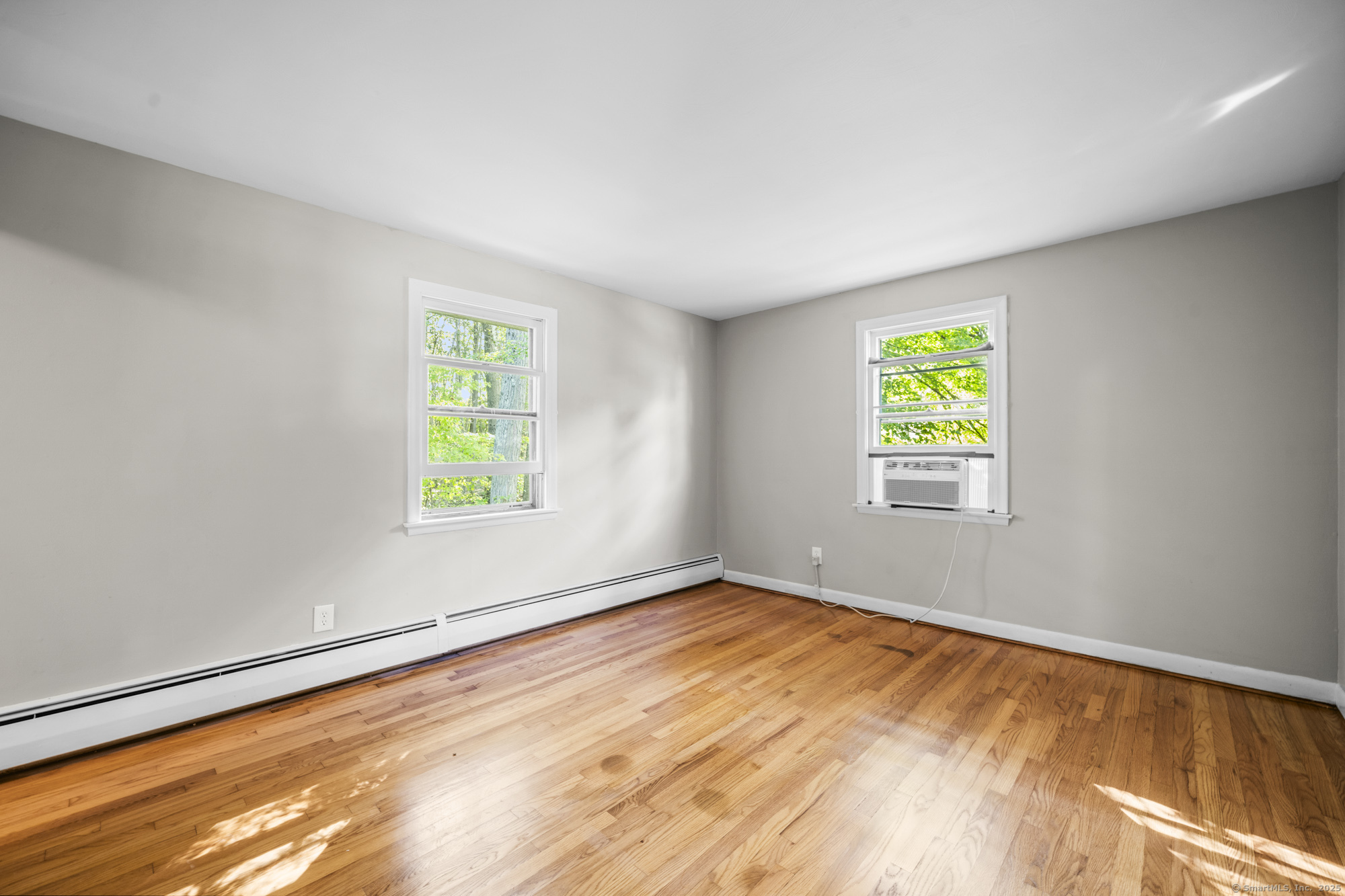 779 Bridge Street Suffield, CT 06078 - Photo 20 of 35 a view of an empty room with a window