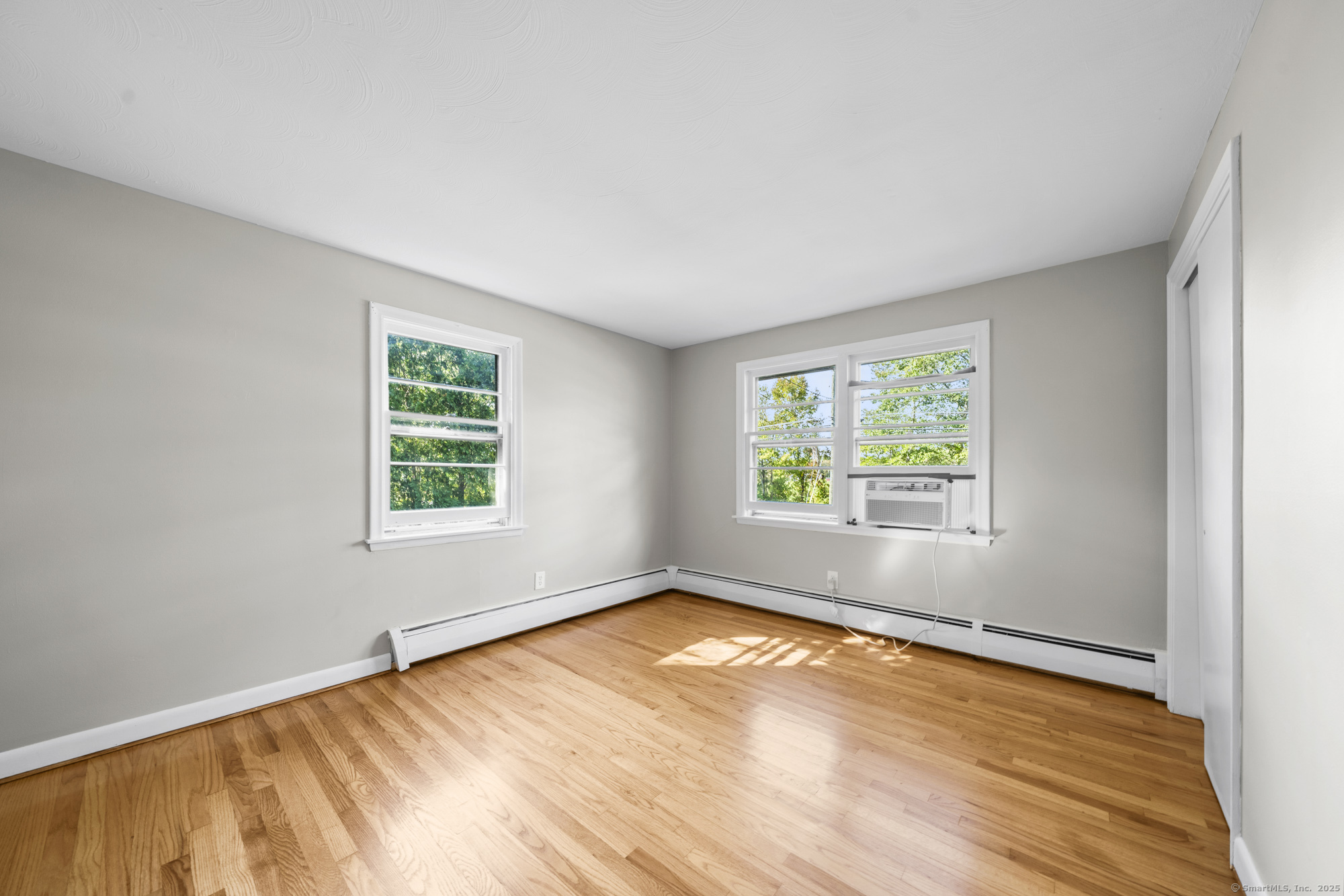 779 Bridge Street Suffield, CT 06078 - Photo 24 of 35 an empty room with a window