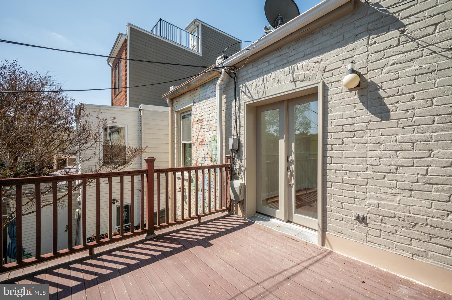 613 14th Place Northeast Washington, DC 20002 - Photo 22 of 31 a view of a balcony with wooden floor