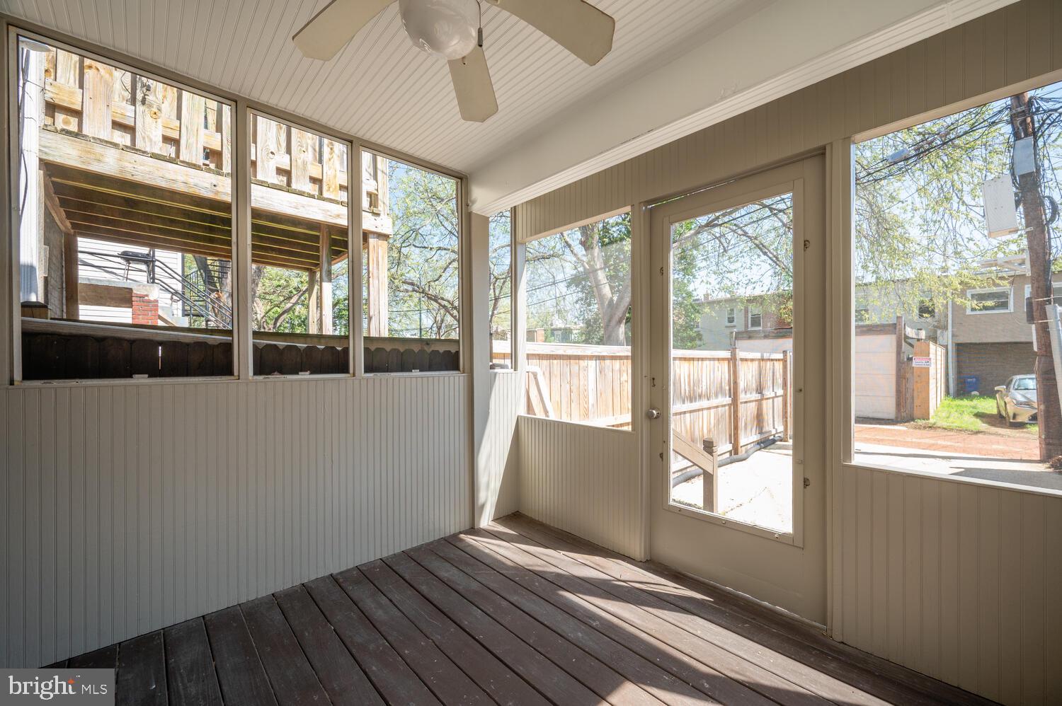 613 14th Place Northeast Washington, DC 20002 - Photo 27 of 31 a view of an empty room with wooden floor and a window