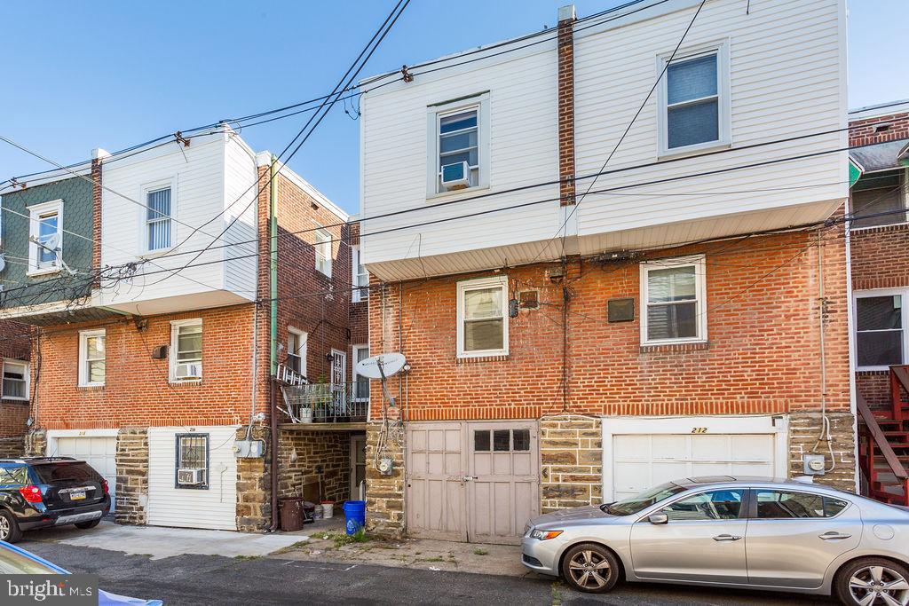 214 Kingston Road Upper Darby, PA 19082 - Photo 23 of 23 a car parked in front of a building