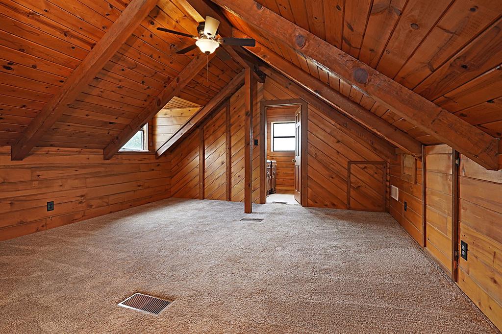 371 Spring Street Forestburg, TX 76239 - Photo 19 of 38 a view of an empty room with a garage