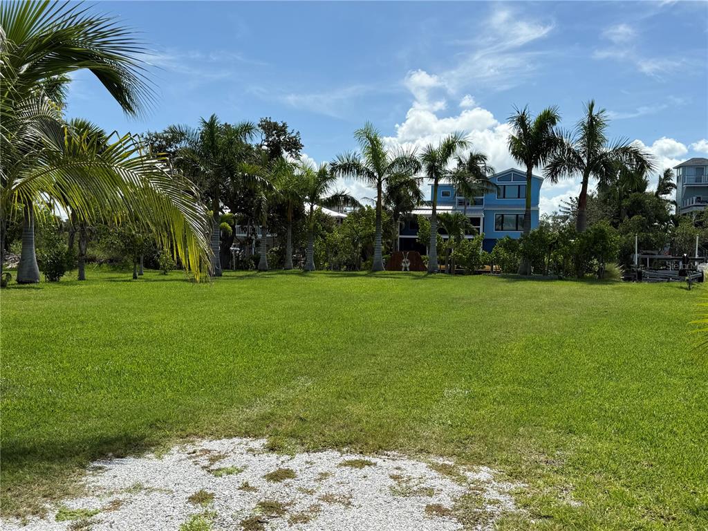 124 Burns Road Terra Ceia, FL 34250 - Photo 2 of 12 a house view with a garden space