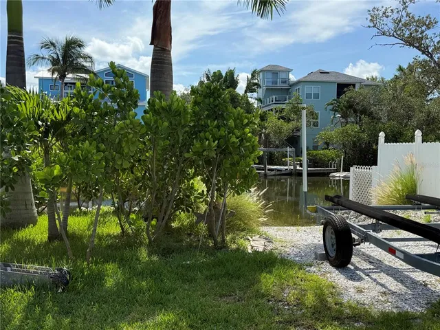 a view of a garden with a lake view