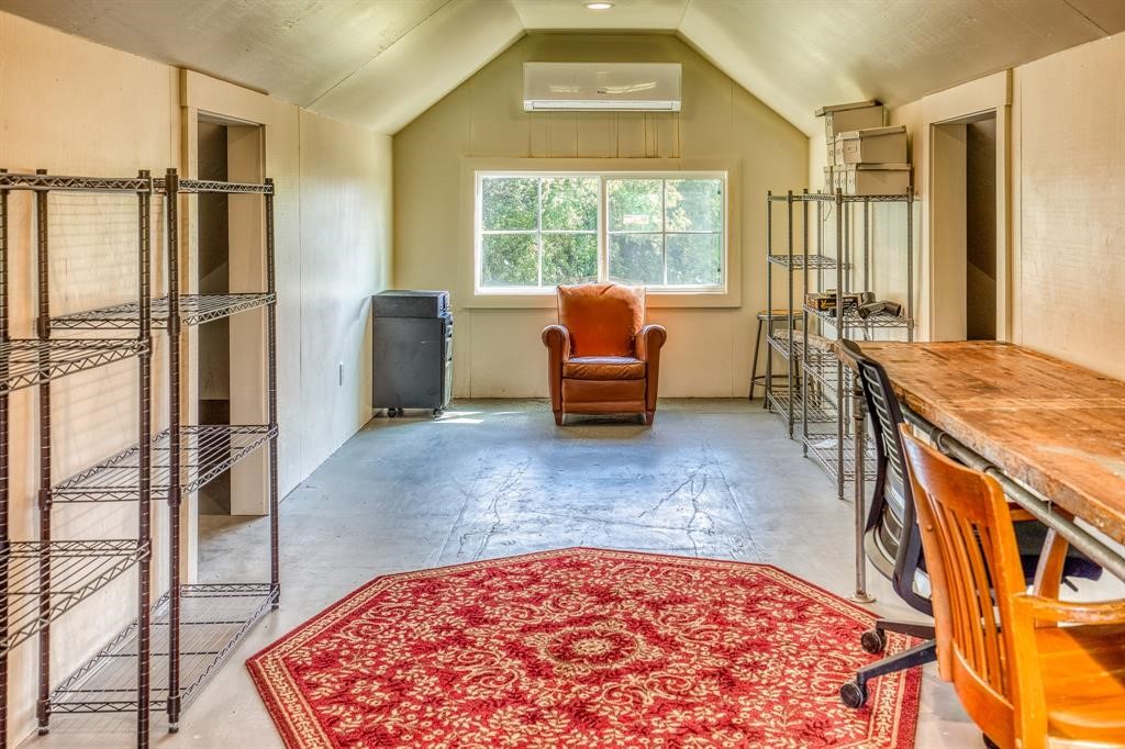 6900 Schroeder Road Brenham, TX 77833 - Photo 28 of 31 a living room with a couch and a table