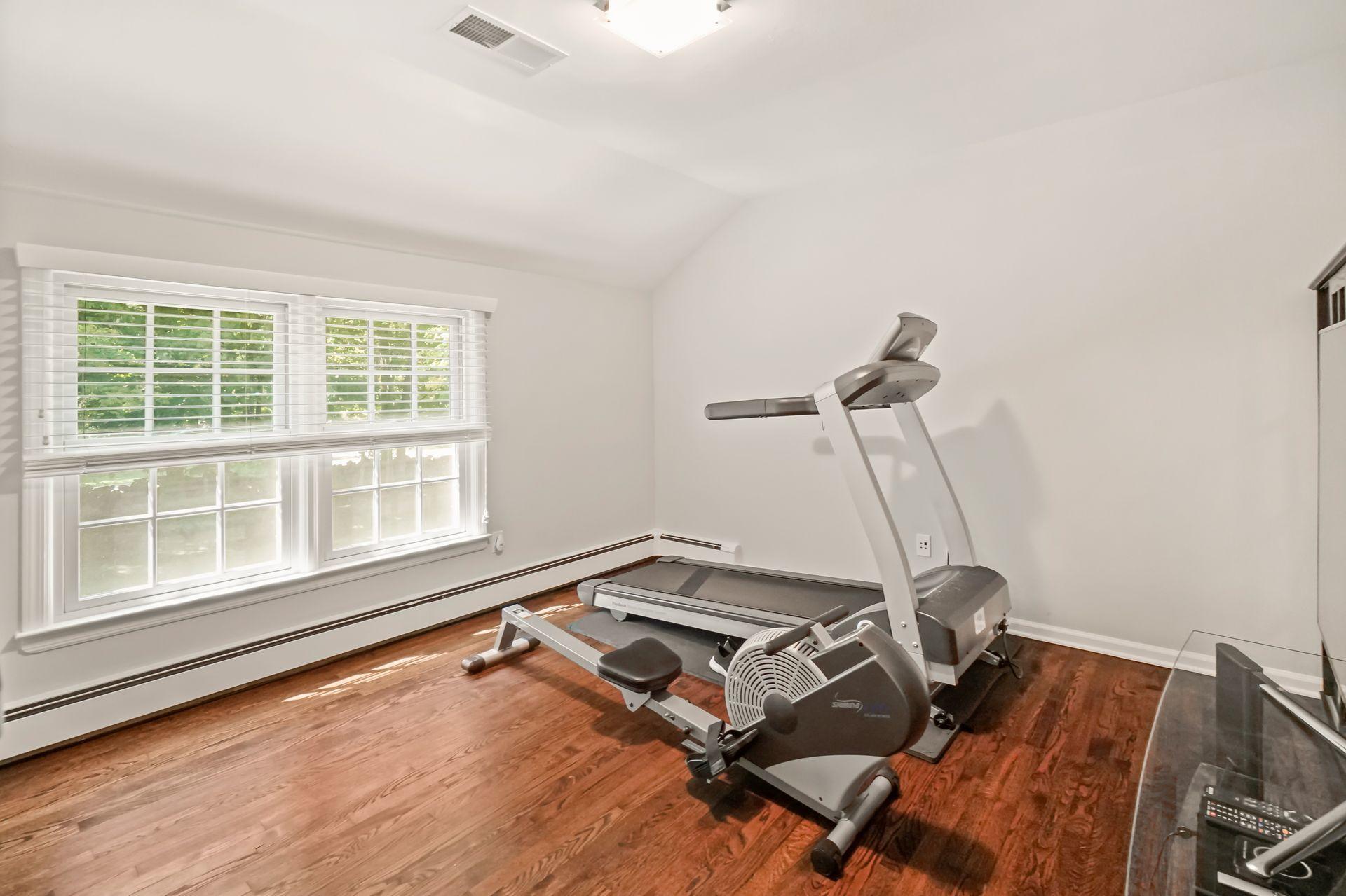 231 Ponus Ridge Road New Canaan, CT 06840 - Photo 23 of 37 a room with gym equipment