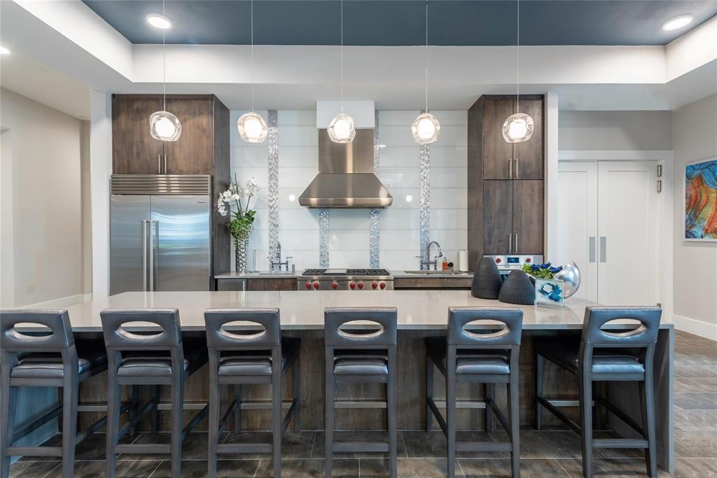 3100 Kramer Lane, Unit 546 Austin, TX 78758 - Photo 3 of 16 a kitchen with a table and chairs in it