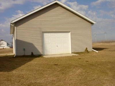653 West Florence Road Freeport, IL 61032 - Photo 3 of 9 a view of a house with a yard