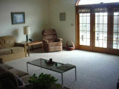 653 West Florence Road Freeport, IL 61032 - Photo 5 of 9 a living room with furniture and a window