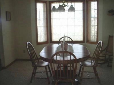 653 West Florence Road Freeport, IL 61032 - Photo 6 of 9 a view of a dining room with furniture and window