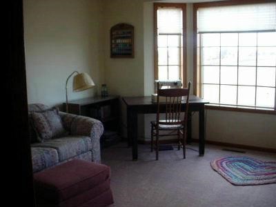 653 West Florence Road Freeport, IL 61032 - Photo 7 of 9 a living room with furniture and a window
