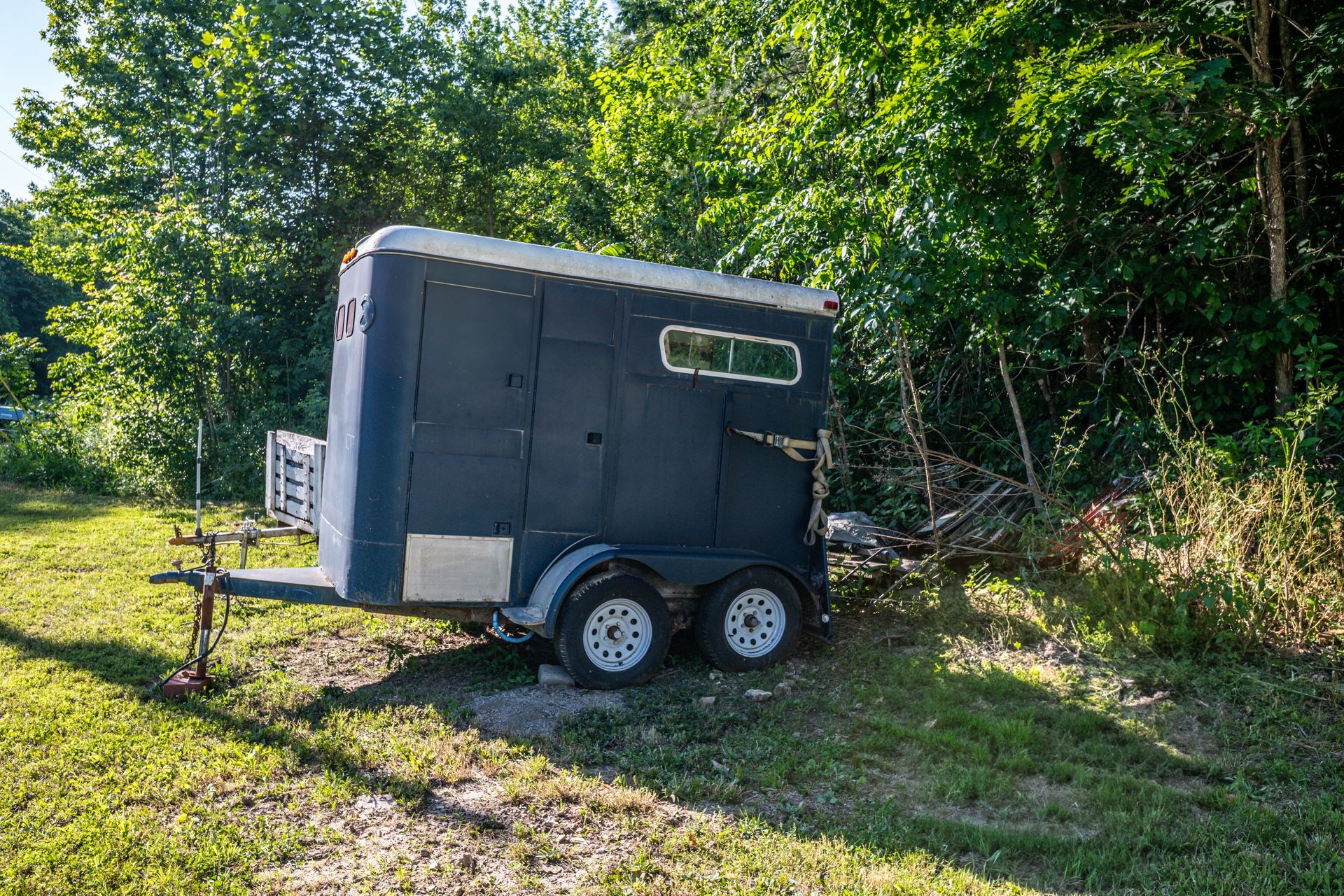 1882 Morris Road Holladay, TN 38341 - Photo 14 of 43 a front view of a house with a garden and trees