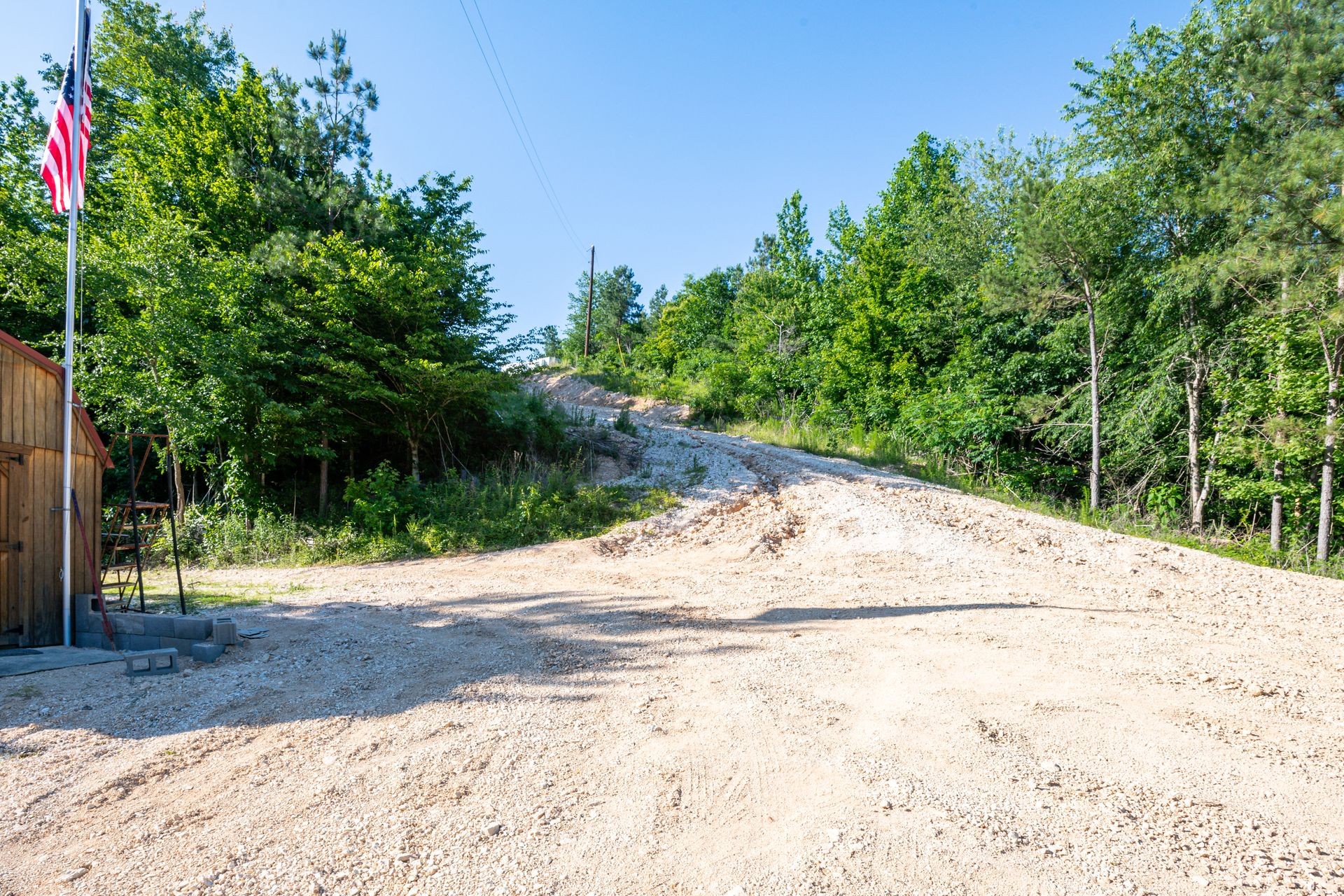 1882 Morris Road Holladay, TN 38341 - Photo 17 of 43 a view of a road with a trees