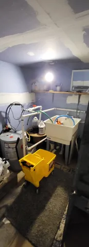 a kitchen with stainless steel appliances granite countertop a stove and a sink