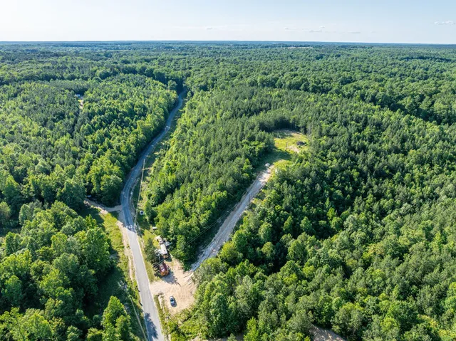 a view of a backyard with a house