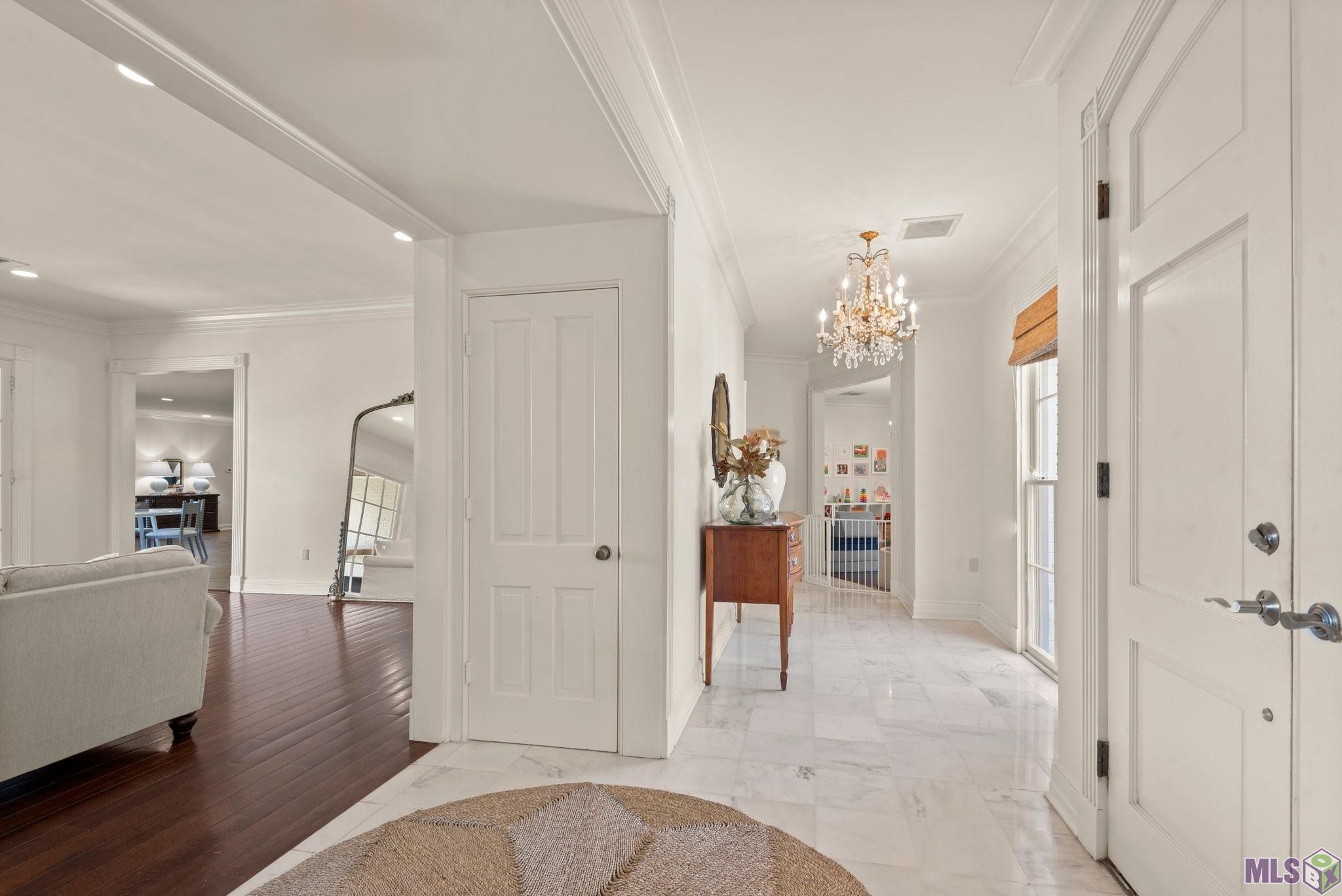7128 Boyce Drive Baton Rouge, LA 70809 - Photo 14 of 60 Foyer into DR (used as toy room)