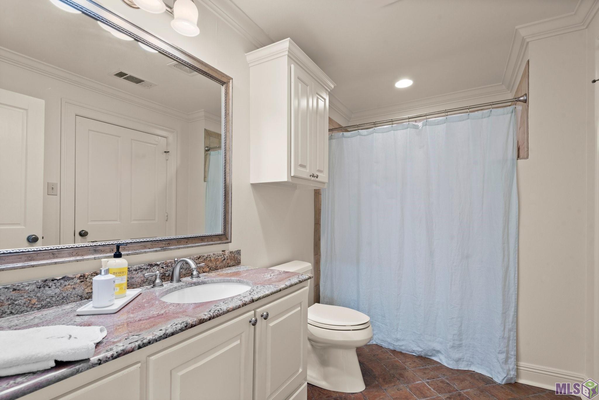 7128 Boyce Drive Baton Rouge, LA 70809 - Photo 39 of 60 Downstairs MIL full bath