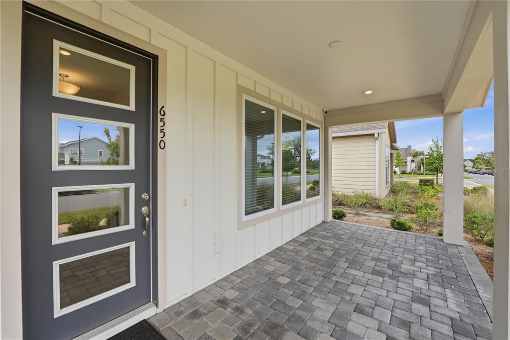 6550 Barnstorm Way St. Cloud, FL 34771 - Photo 2 of 35 a view of an entryway of house