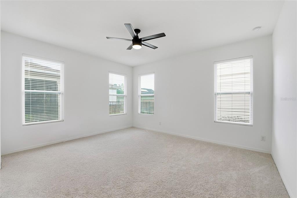 6550 Barnstorm Way St. Cloud, FL 34771 - Photo 21 of 35 a view of an empty room with a window and closet area