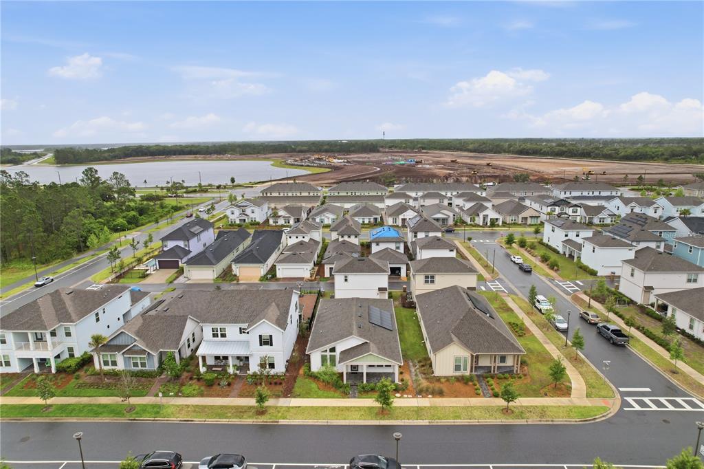 6550 Barnstorm Way St. Cloud, FL 34771 - Photo 30 of 35 an aerial view of residential houses with outdoor space