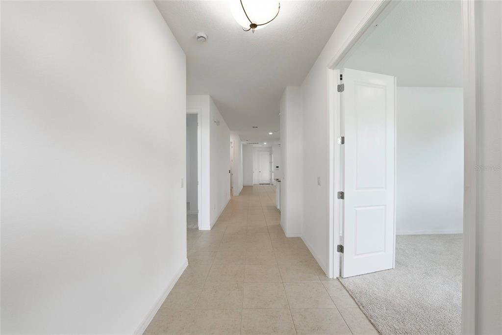 6550 Barnstorm Way St. Cloud, FL 34771 - Photo 6 of 35 a view of a hallway