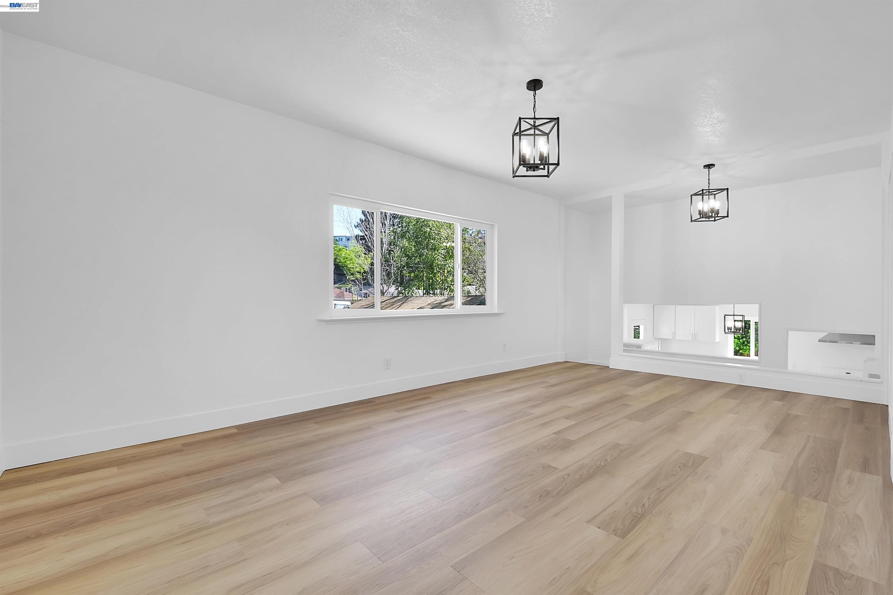 1467 Clay Street Hayward, CA 94541 - Photo 15 of 28 wooden floor in an empty room with a window