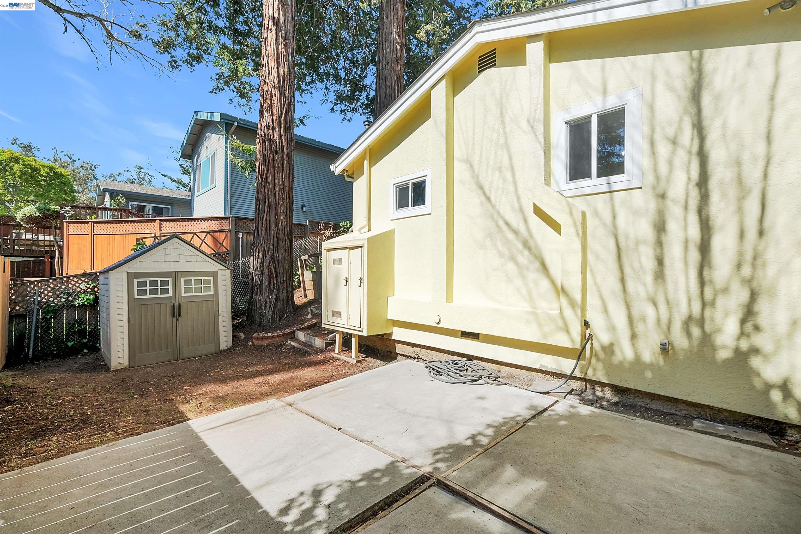 1467 Clay Street Hayward, CA 94541 - Photo 17 of 28 a view of a house with a wooden wall
