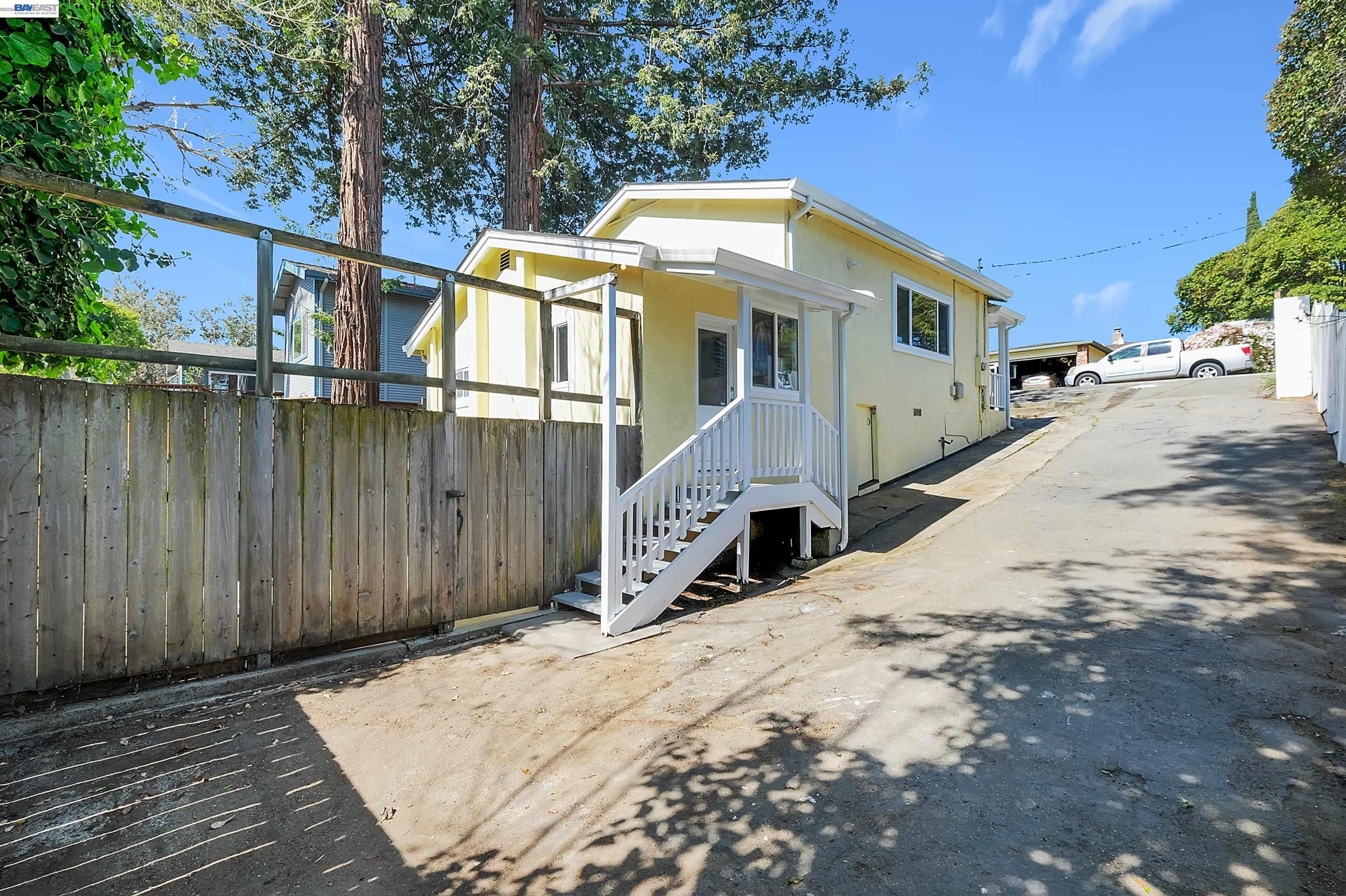 1467 Clay Street Hayward, CA 94541 - Photo 24 of 28 a view of a house with wooden fence