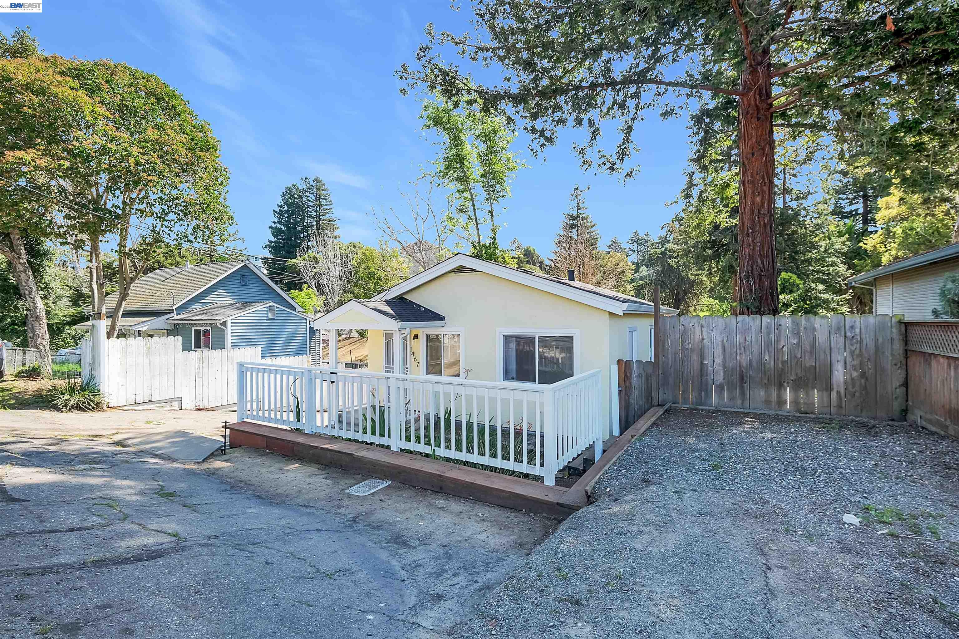 1467 Clay Street Hayward, CA 94541 - Photo 27 of 28 a view of a house with a yard and fence
