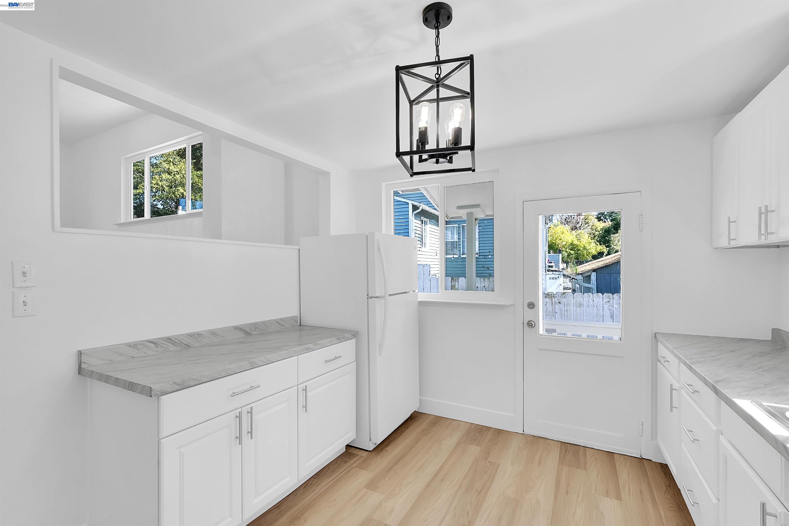 1467 Clay Street Hayward, CA 94541 - Photo 5 of 28 an entryway with wooden floor and cabinet