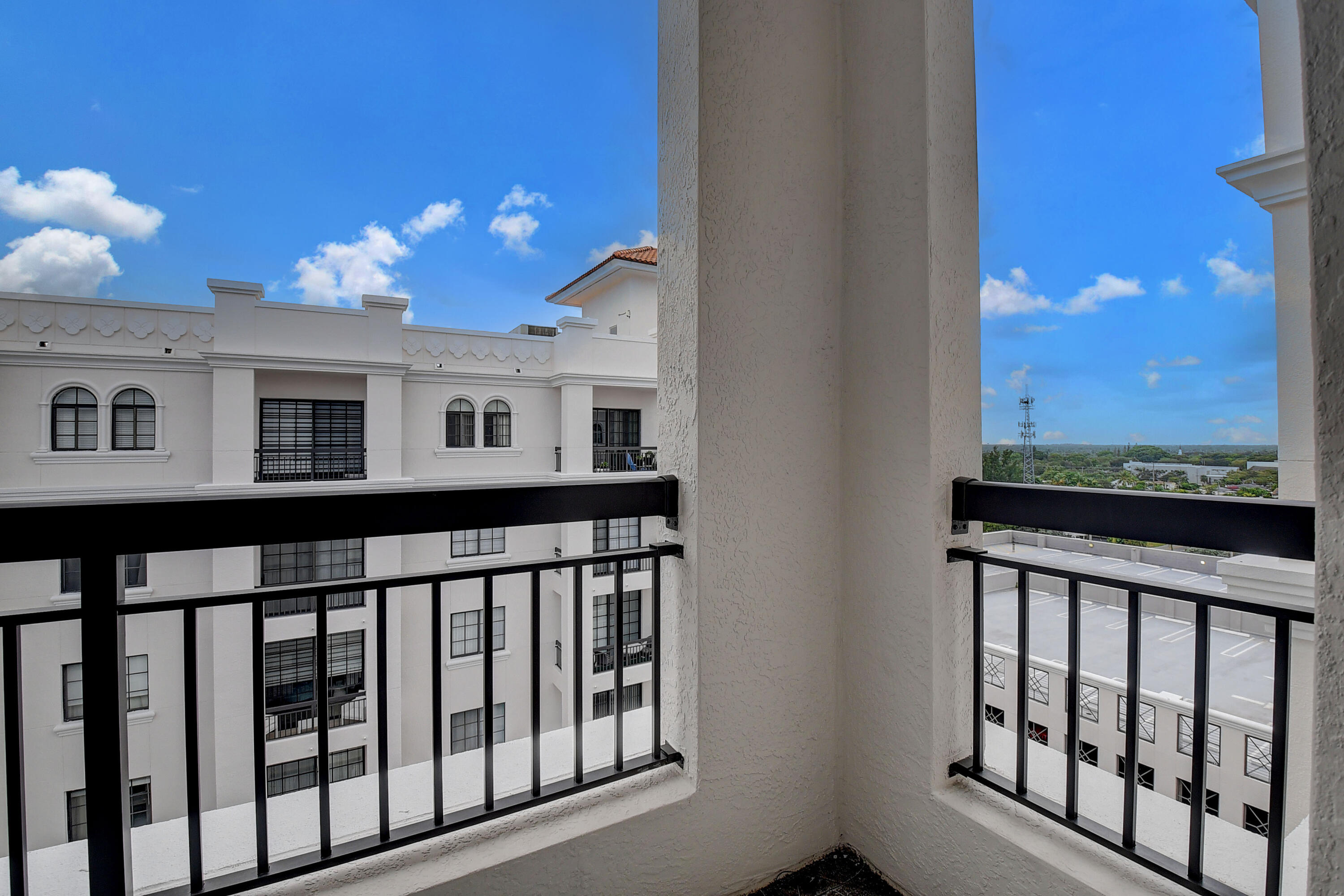 233 South Federal Highway, Unit UPH04 Boca Raton, FL 33432 - Photo 12 of 26 a view of a porch with a yard