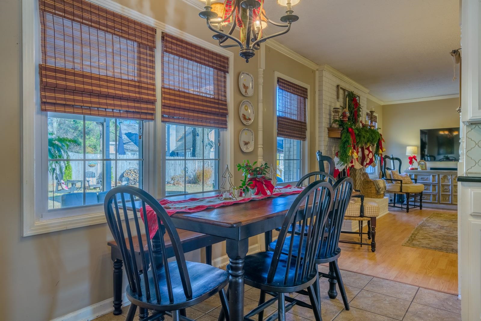 704 Irene Circle Covington, TN 38019 - Photo 13 of 31 a view of a dining room with furniture window and outside view
