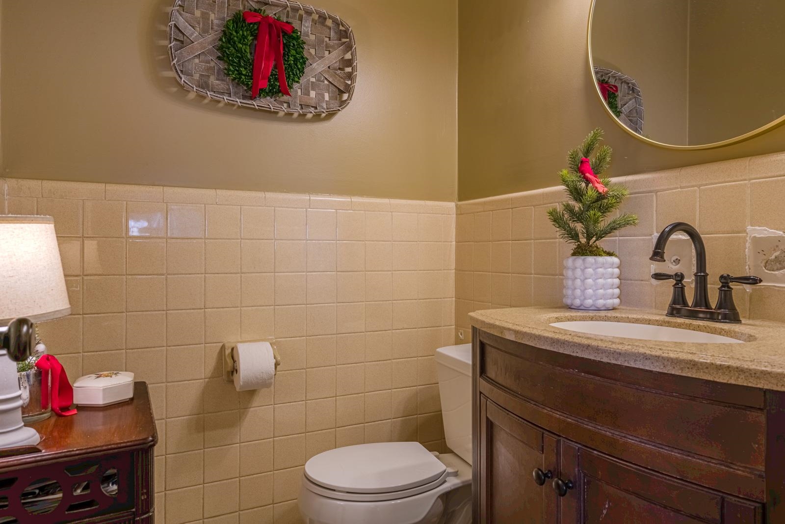 704 Irene Circle Covington, TN 38019 - Photo 15 of 31 a bathroom with a sink and a mirror