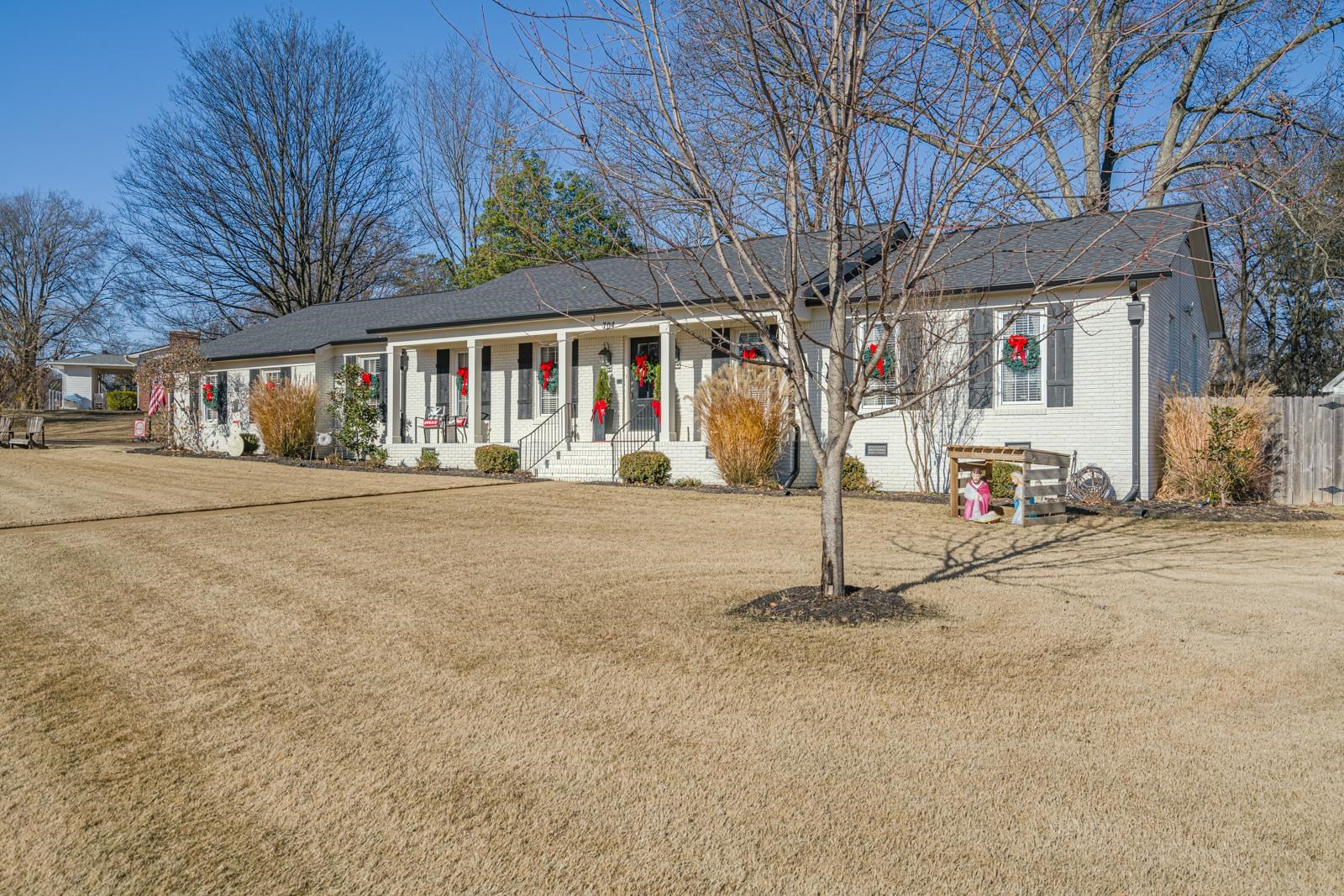 704 Irene Circle Covington, TN 38019 - Photo 2 of 31 a front view of building with street