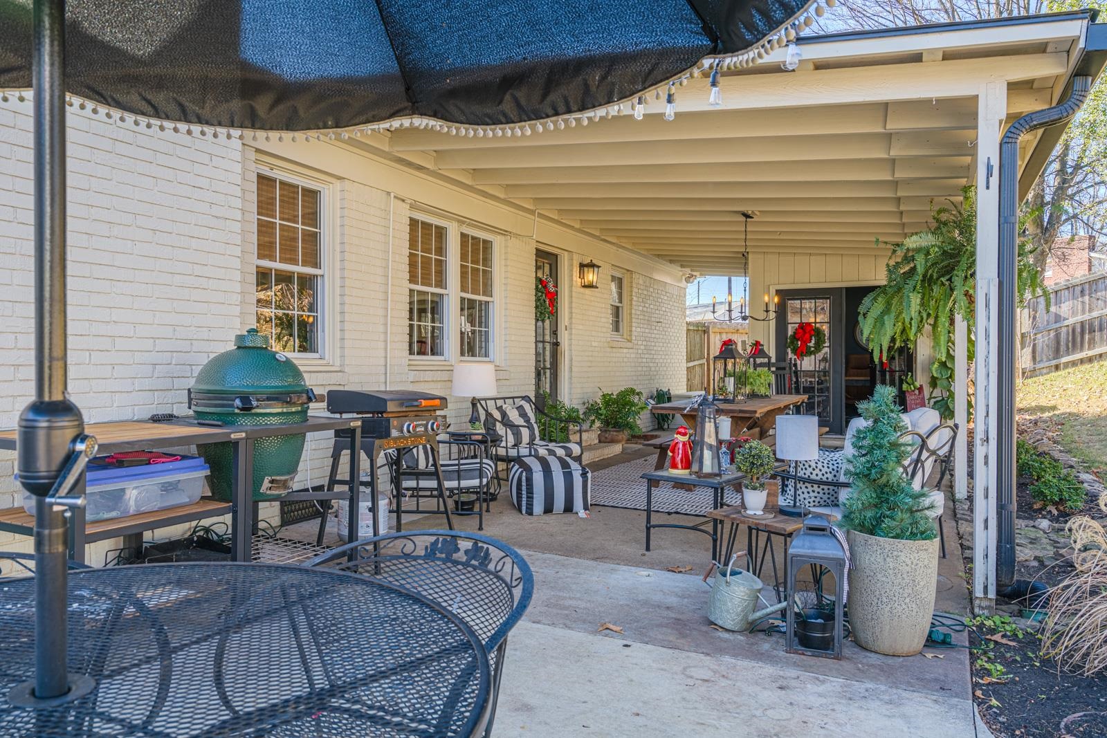 704 Irene Circle Covington, TN 38019 - Photo 27 of 31 a outdoor living space with furniture and potted plants