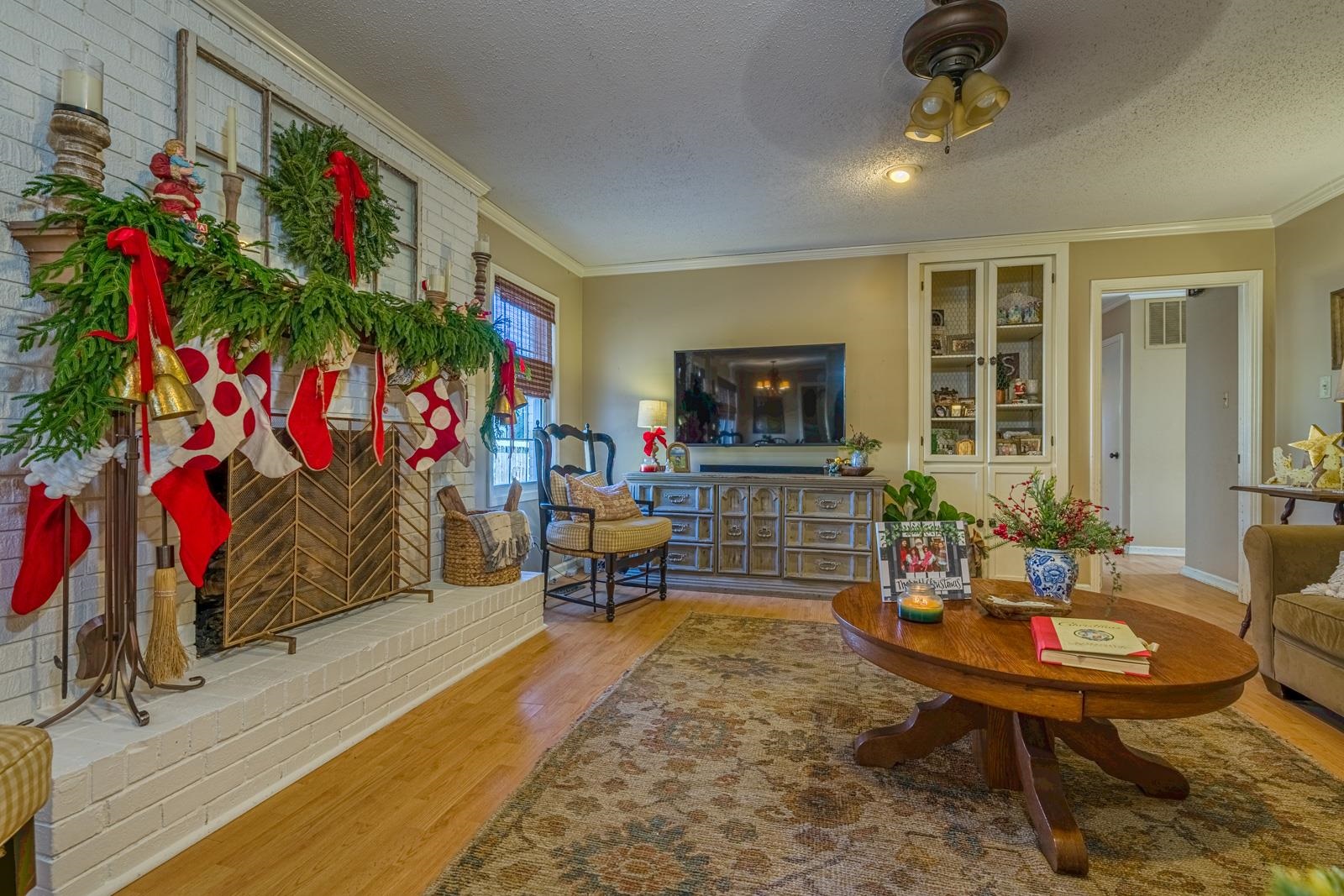 704 Irene Circle Covington, TN 38019 - Photo 9 of 31 a living room with furniture and a flat screen tv