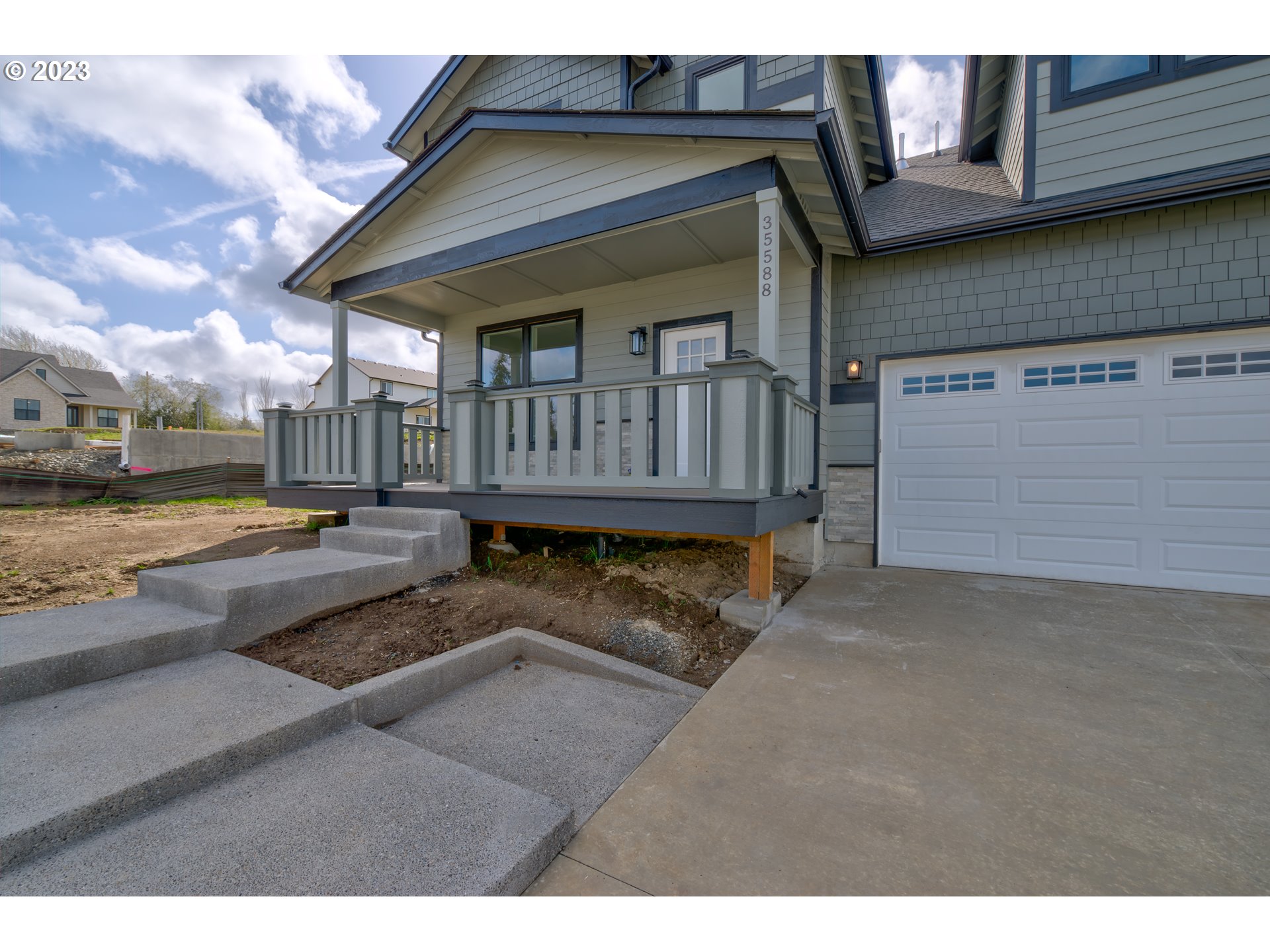 35588 Bella Rdg Loop Astoria, OR 97103 - Photo 3 of 41 a view of a house with a wooden deck