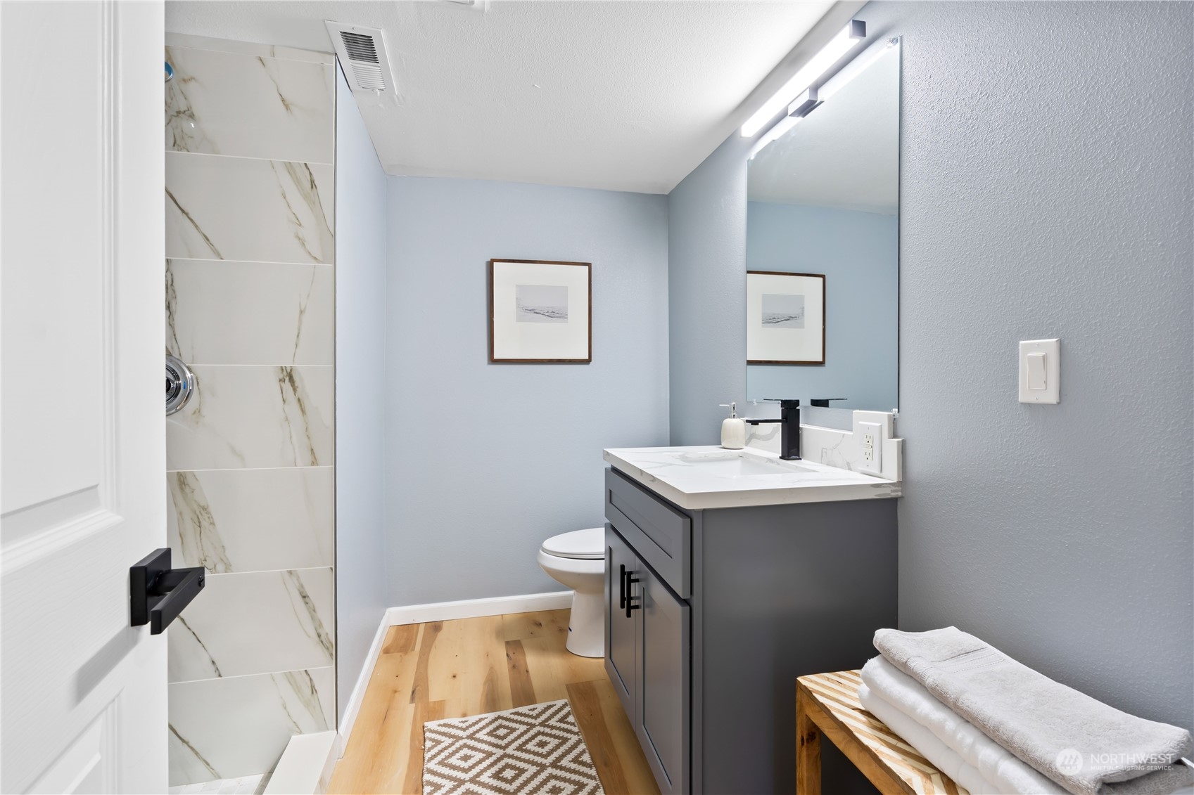 1909 Gary Street Sumner, WA 98390 - Photo 11 of 39 a bathroom with a sink toilet and shower