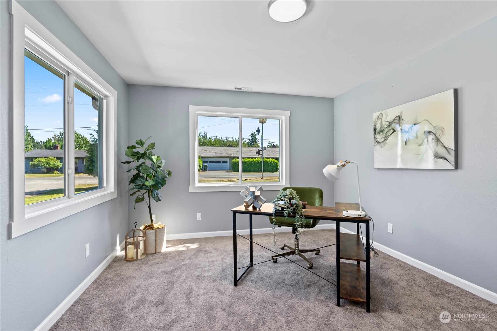 1909 Gary Street Sumner, WA 98390 - Photo 13 of 39 a living room with furniture and a window