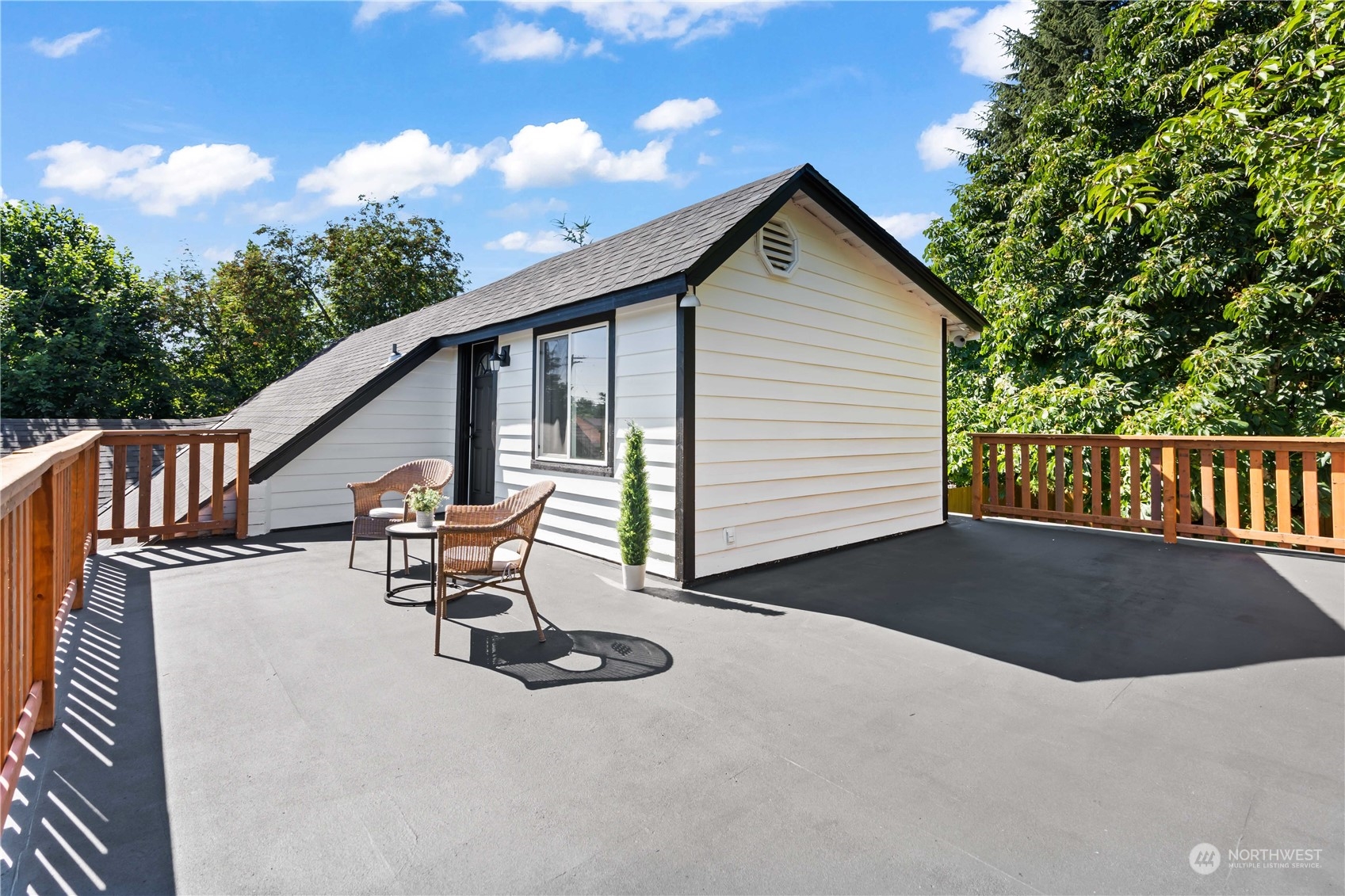 1909 Gary Street Sumner, WA 98390 - Photo 23 of 39 a view of a patio with a table and chairs