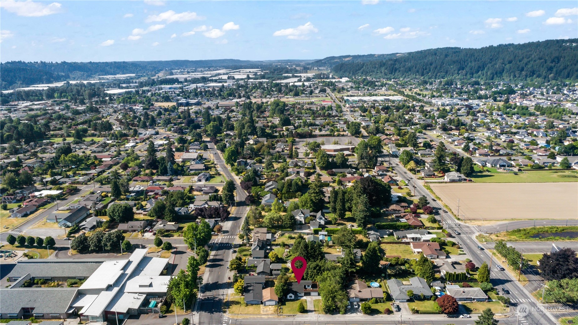 1909 Gary Street Sumner, WA 98390 - Photo 34 of 39 an aerial view of residential houses with city view