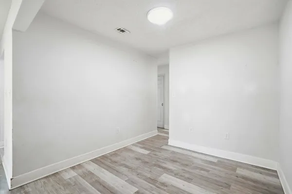 a view of a backyard of the house