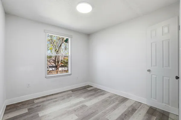 a view of a house with a small yard