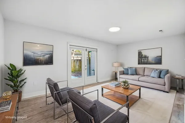 a kitchen with stainless steel appliances a refrigerator stove and microwave