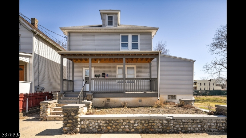 a front view of a house with entertaining space