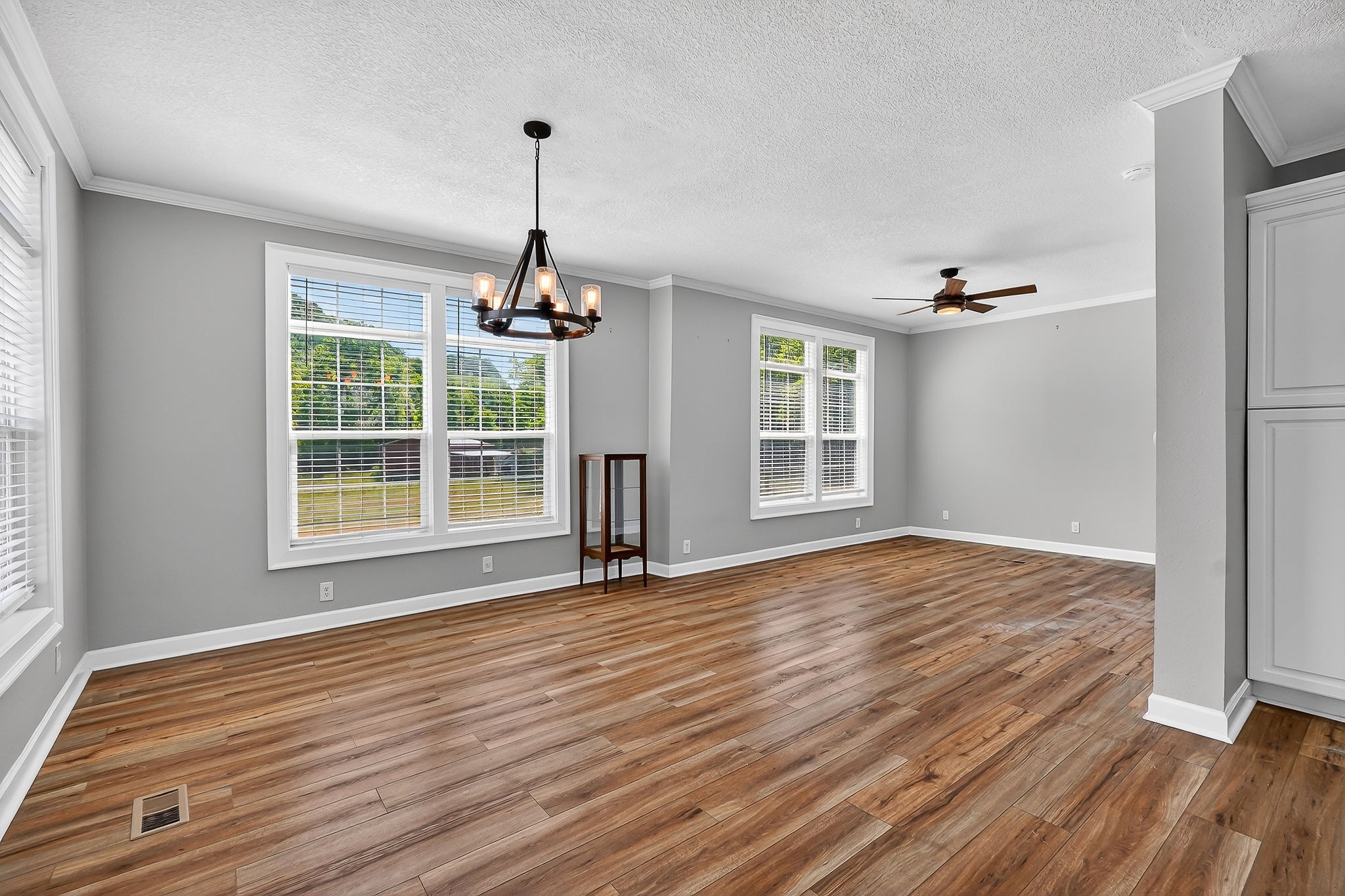 16062 Buffalo Valley Road Silver Point, TN 38582 - Photo 11 of 27 a view of an empty room with wooden floor and a window