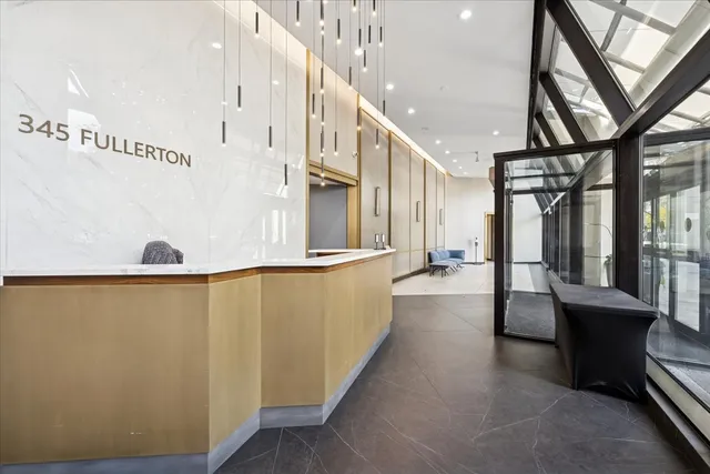 a view of a living room with a large window