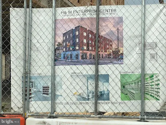 a view of a brick building with a tree
