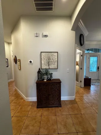 a kitchen with a table and chairs in it